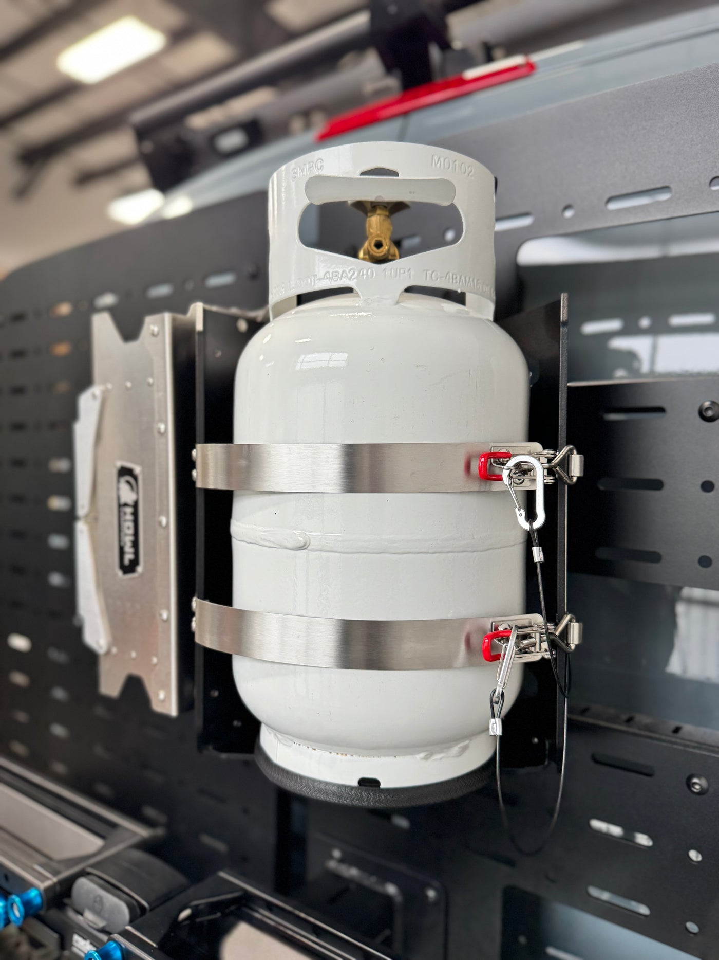 Shuksan PS-10-HR1 with 10lb propane tank mounted to Sprinter rear door carrier