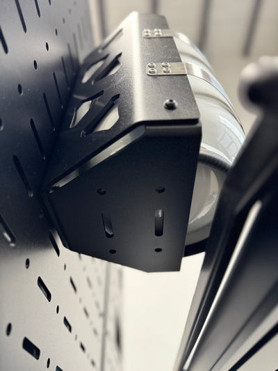 Aluminum propane tank bracket for overlanding and vans showing mounting options in bottom of bracket